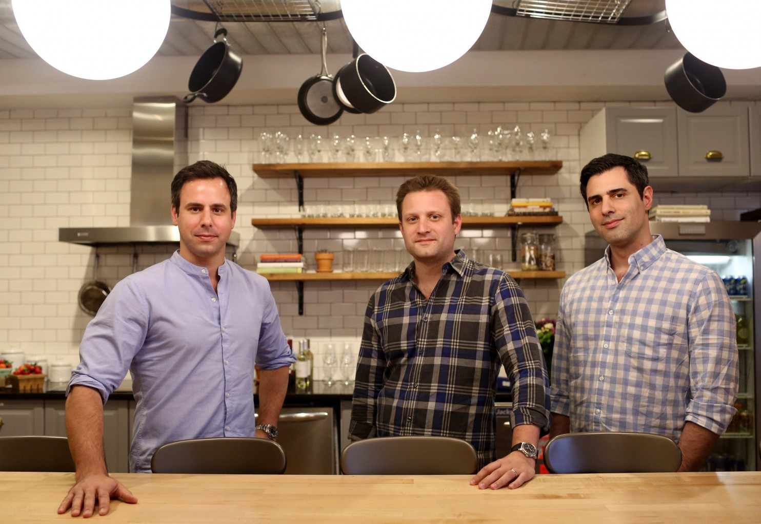 Matt Wadiak, Matt Salzberg and Ilia Papas, co-founders of the recipe delivery service Blue Apron, at their office in New York City. (Yana Paskova/For The Washington Post)